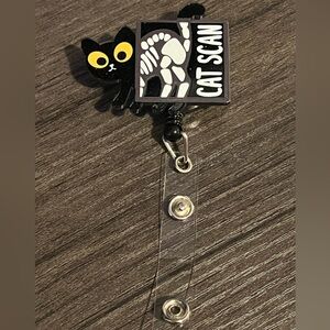 Cat scan badge reel